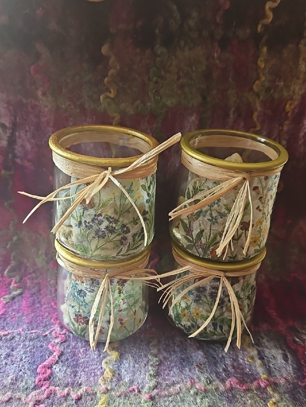 Decopaged Floral Glass Jars. Gold Painted Rim & Wrapped w/ Raffia Filled w/stone